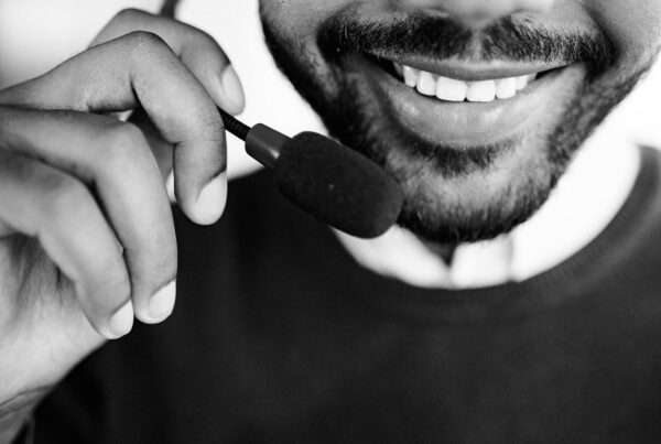 Customer service agents working alongside AI technology in a modern call center