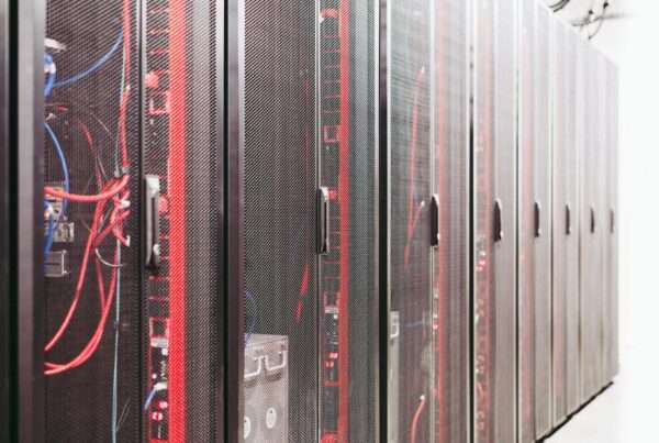 How Managed IT Services Help Businesses Reduce Downtime and IT Headaches 6 Server room and network infrastructure managed by IT professionals to reduce downtime