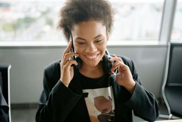 Professional answering service representative handling small business calls