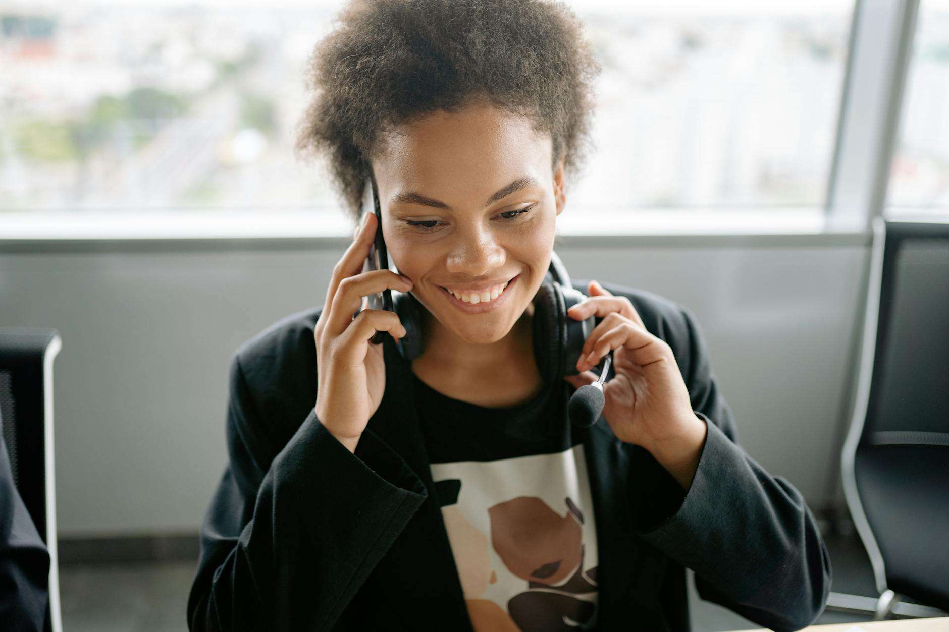 Professional answering service representative handling small business calls