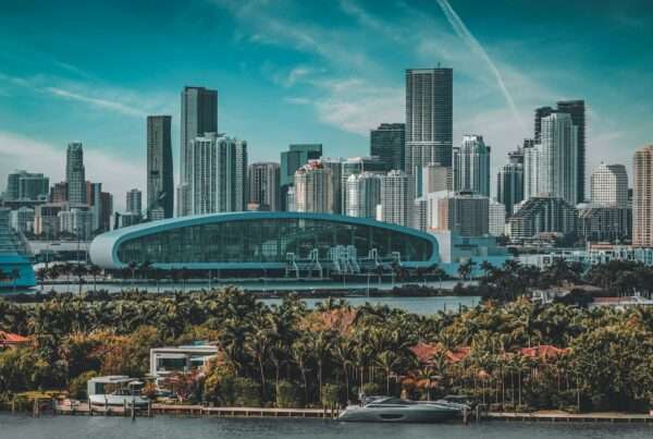 IT Support in Miami: How Small Businesses Thrive with Cytranet 6 Scenic view of Miami skyline with modern skyscrapers and waterfront under blue skies