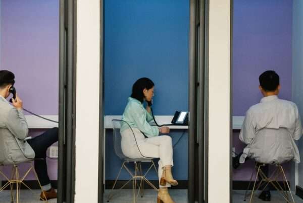 Team using a modern cloud business phone system in an office