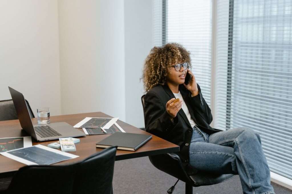 Cloud Phone Provider Pricing Breakdown: Hidden Costs, Plan Comparisons, and Why Cytranet Offers Better Value 1 Business professional analyzing cloud phone system pricing and plan comparisons on a laptop