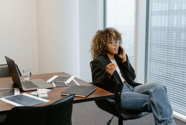 Cloud Phone Provider Pricing Breakdown: Hidden Costs, Plan Comparisons, and Why Cytranet Offers Better Value 4 Business professional analyzing cloud phone system pricing and plan comparisons on a laptop