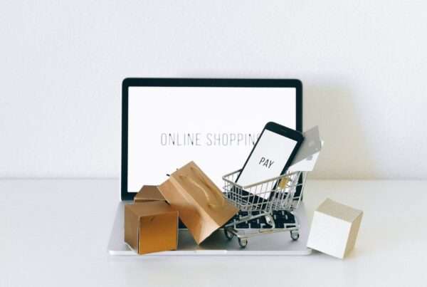 Omnichannel vs. Multichannel Marketing: Key Differences and How to Choose the Right Strategy 7 Online shopping cart and payment devices representing omnichannel marketing
