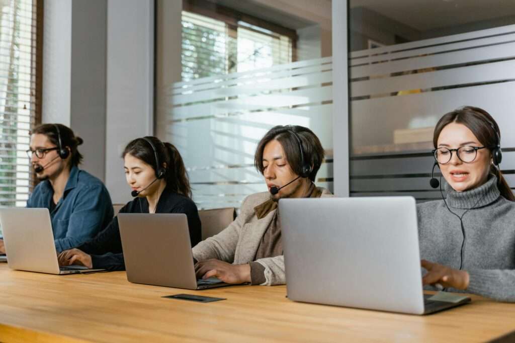 Why Dedicated IT Support Keeps Employees Focused and Businesses Secure 2 Dedicated IT support team helping businesses stay productive and secure