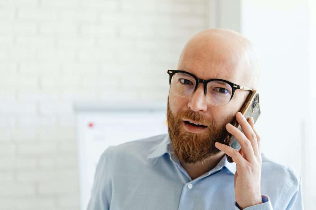 Professional making a business call using a VoIP number
