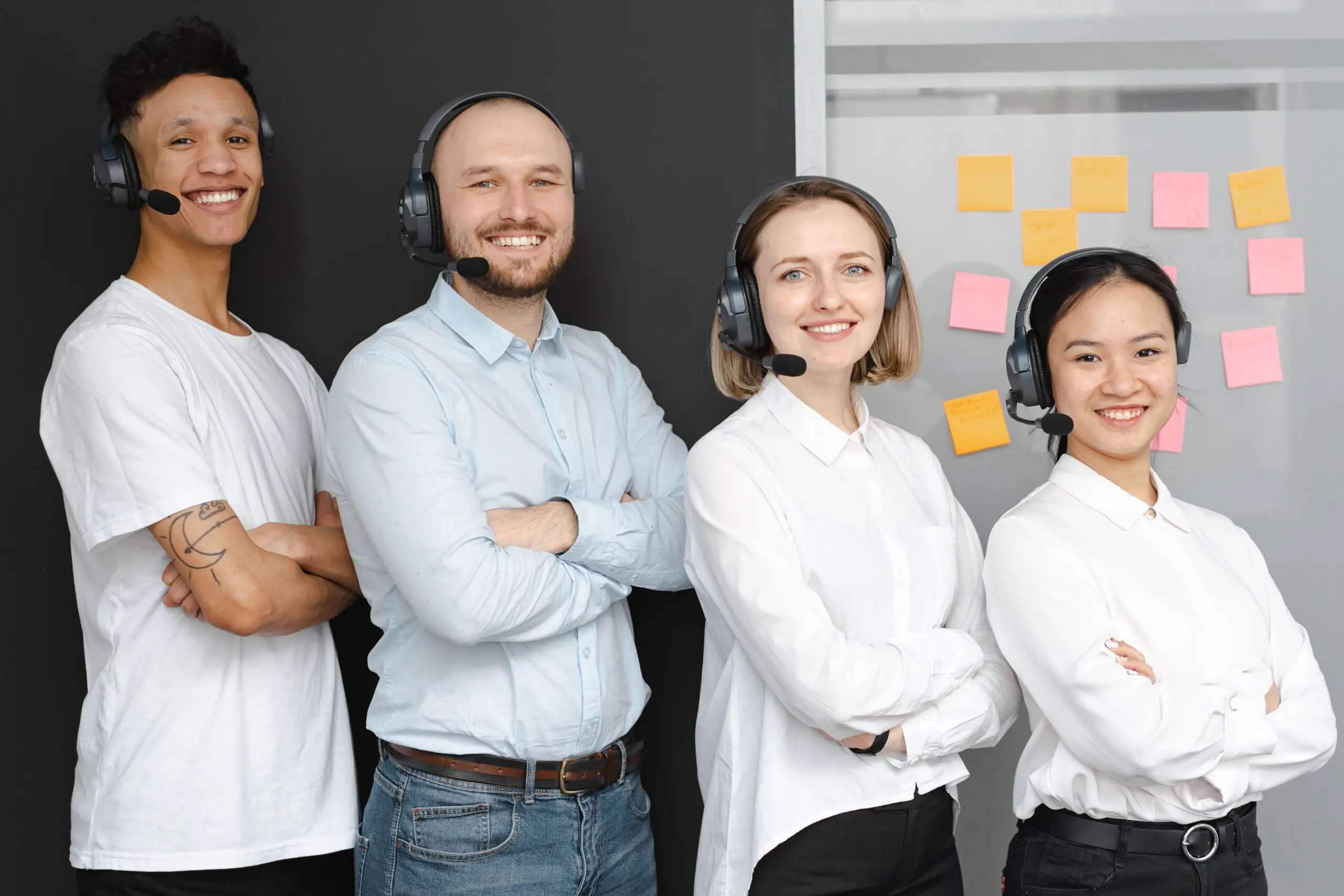 Why Integrations Matter More Than Price When Choosing a Business Phone System 6 Team of business professionals wearing headsets, representing modern unified communications and business phone systems