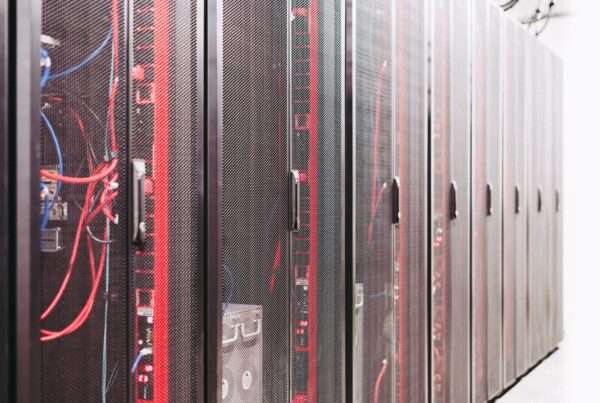 Business Continuity for Business Voice: Keep Customers Connected When Your Primary Site Is Down 8 Network cabling connected to business infrastructure equipment