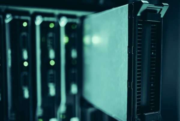 Illuminated server racks in a modern data center representing resilient network infrastructure