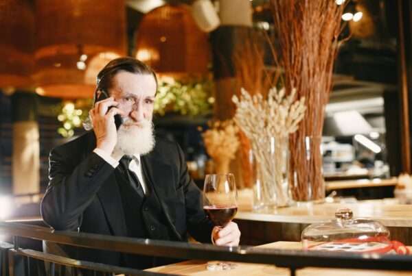 Busy restaurant during dinner service where a cloud phone system helps staff handle high call volume
