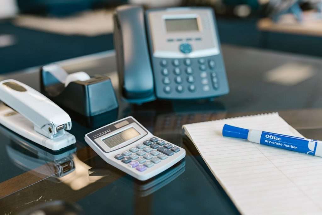 Office desk with a business telephone ready for a new phone system installation