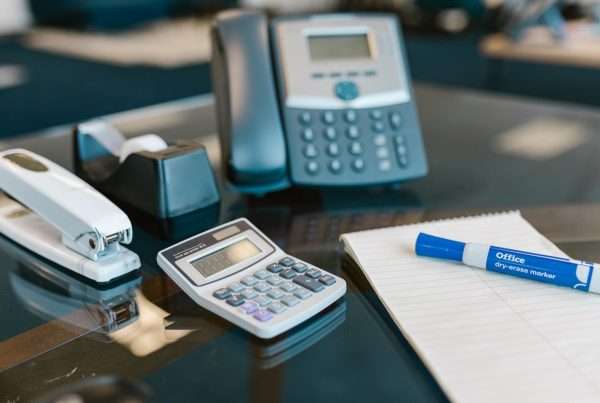 Office desk with a business telephone ready for a new phone system installation