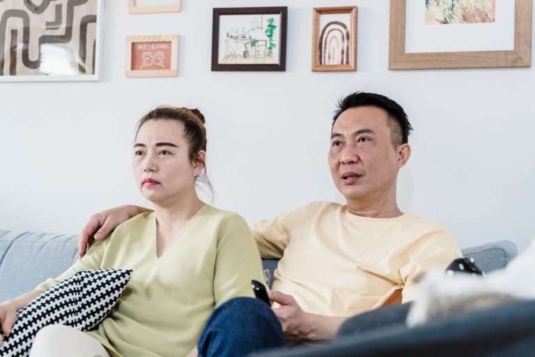 Short Clips, Bundles, and Bandwidth: Cytranet CTO Doug Roberts on What Changing Viewing Habits Mean for Properties and Businesses 2 Couple relaxing on a sofa in a cozy living room while watching television together