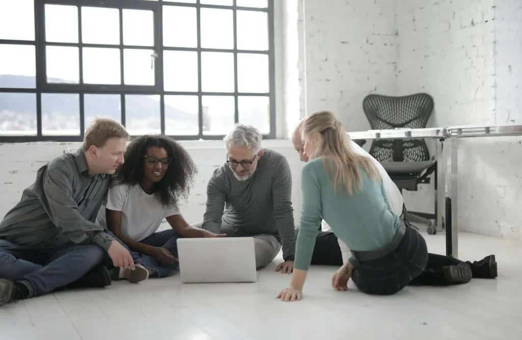 Remote team collaborating with hosted contact center technology