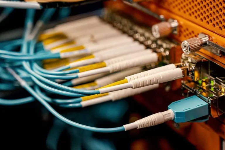 Fiber optic switch with bright connectors powering business network connectivity