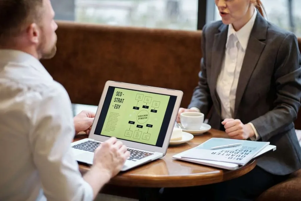 Business professionals discussing IT strategy alignment and technology planning