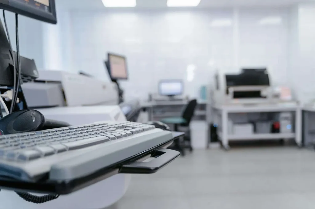 Technology professional working with automated IT systems in a modern office environment