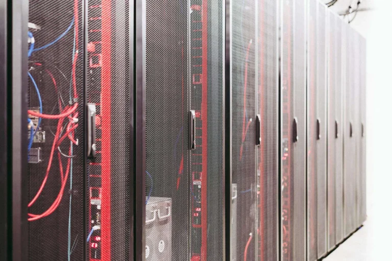 Server room and network infrastructure managed by IT professionals to reduce downtime
