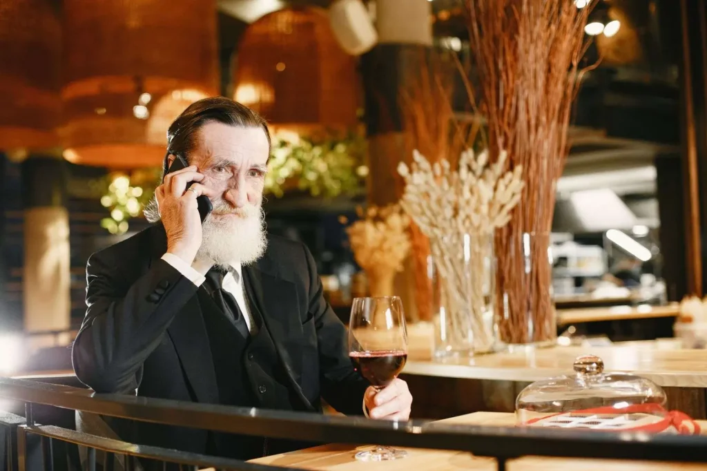 Busy restaurant during dinner service where a cloud phone system helps staff handle high call volume