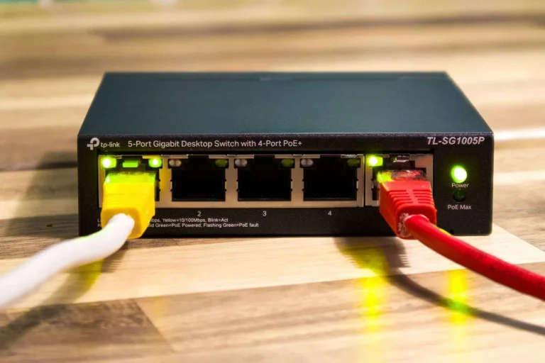 Cytranet Is a Certified TP-Link Omada Partner in Las Vegas 9 TP-Link Omada PoE network switch with connected Ethernet cables for managed business Wi-Fi